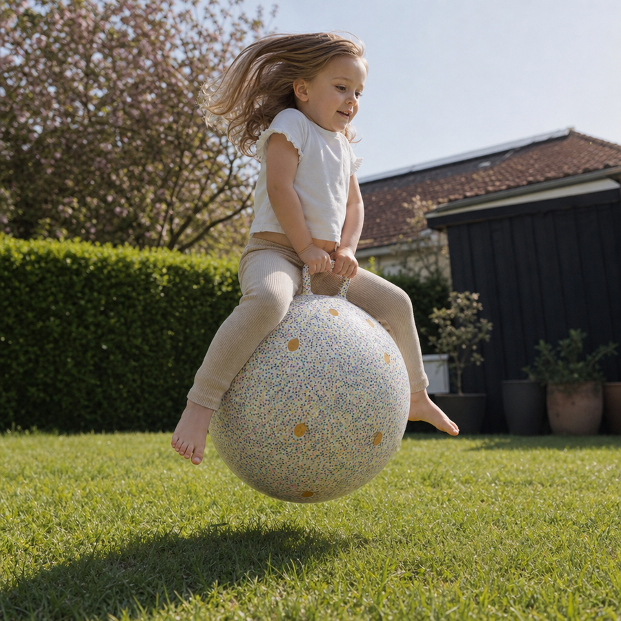Barn leger med Glitter jump ball