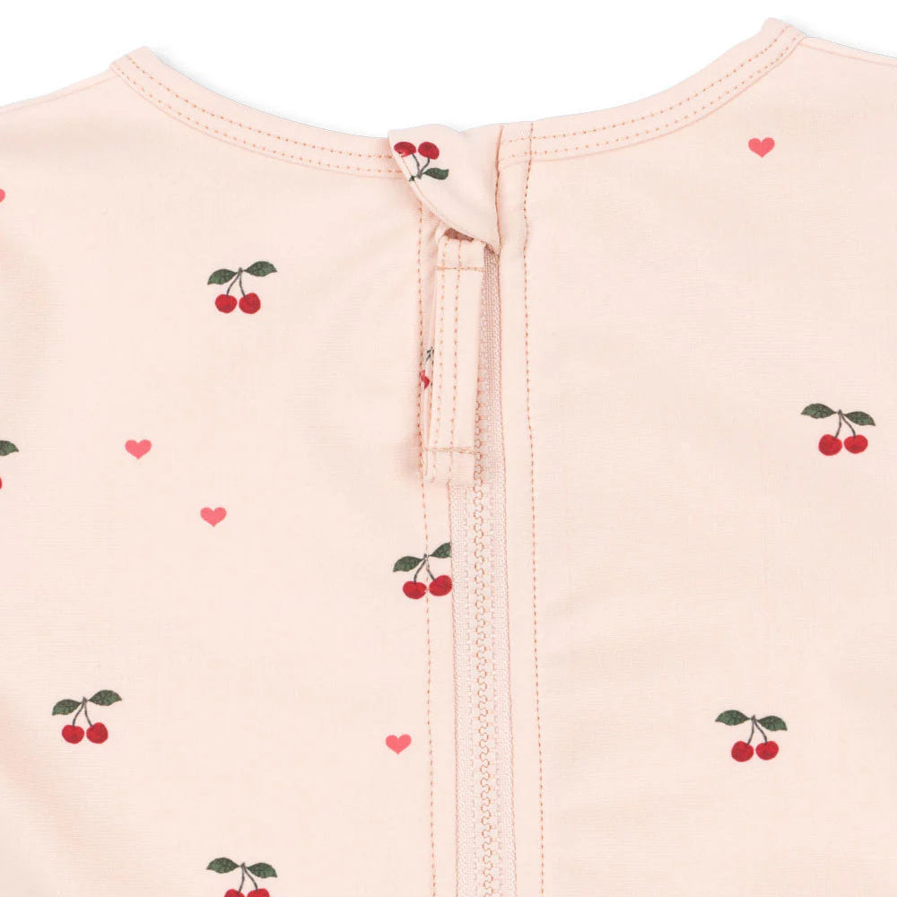 Merle UV dragt - cherry coeur rose