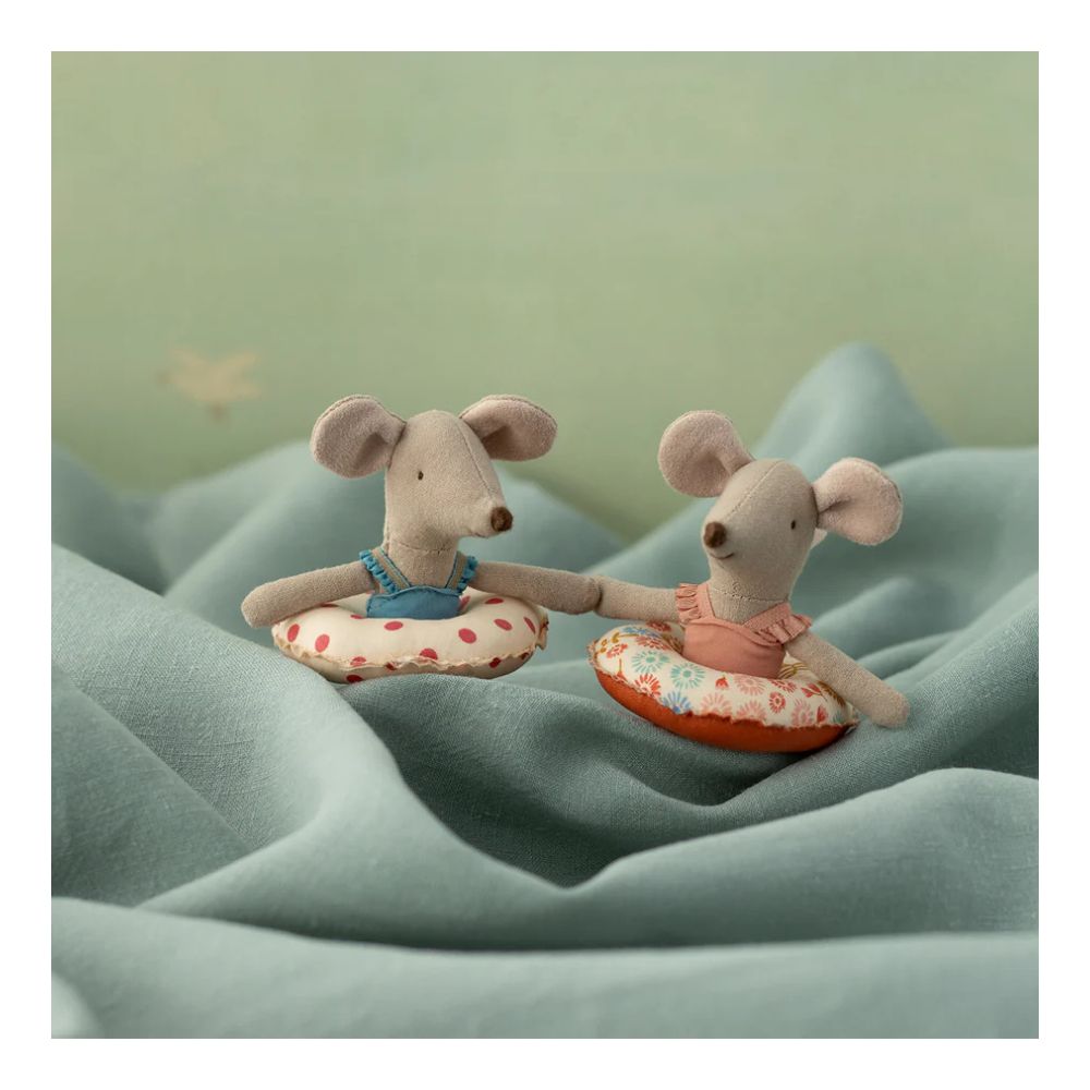 Strandmus med badering